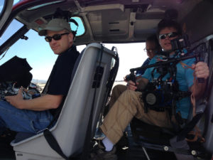 Camera crew in helicopter