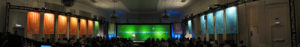 Panoramic view of multi-screen leadership meeting
