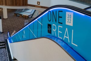 Branded escalator at the Real Brokerage conference