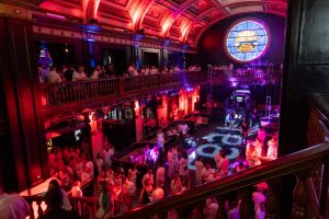 The after party at the Real Brokerage conference, all participants wear white