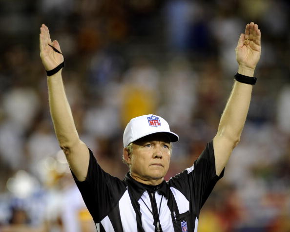 A photo of Walt Coleman refereeing an NFL game.