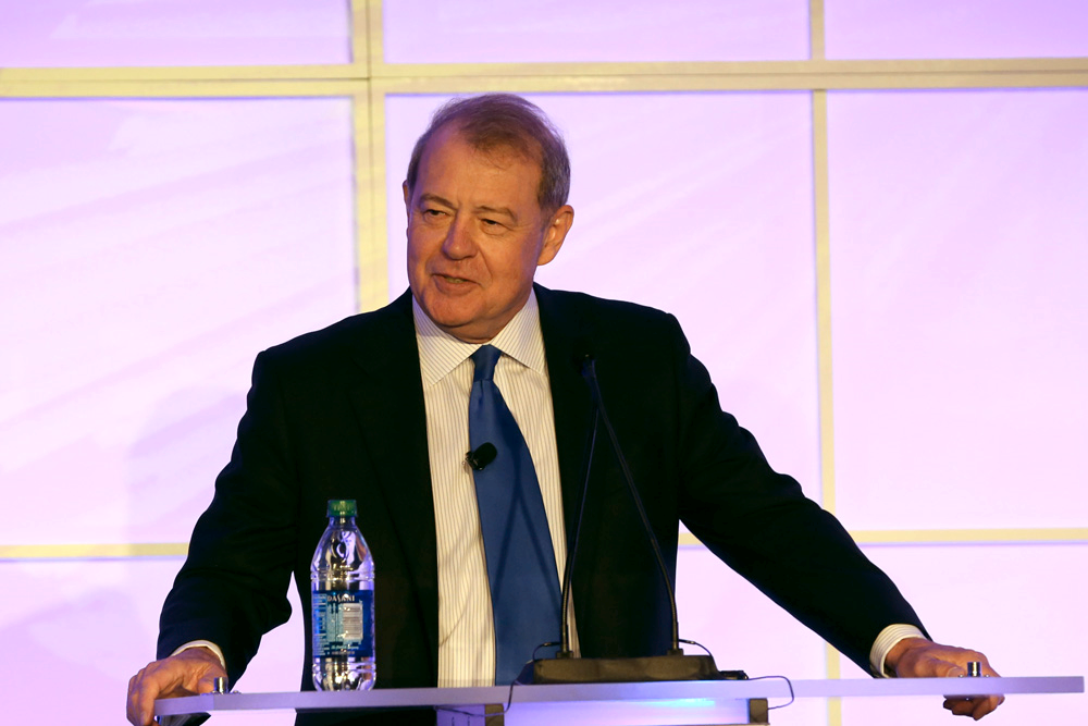A photo of Stuart Varney speaking at a recent Tri-Marq event.