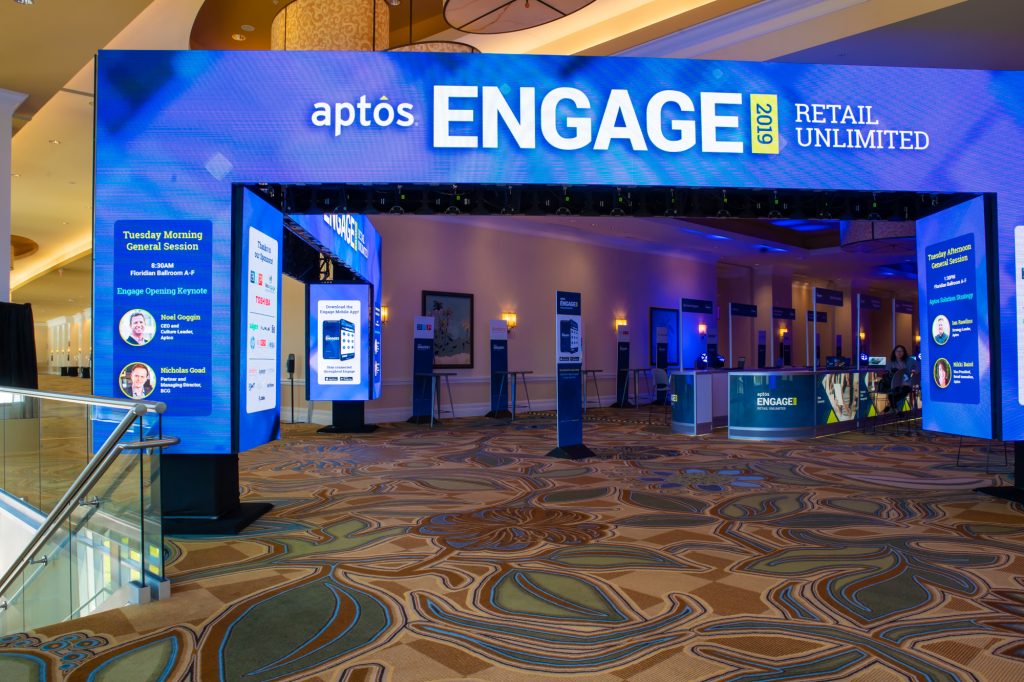 LED arch used as digital signage wayfinding at the Aptos 2019 conference. 