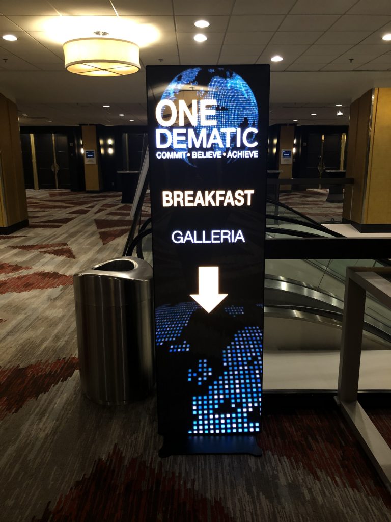LED poster used as wayfinding sign at the Dematic user conference. Shows the attendees that they need to head downstairs. 