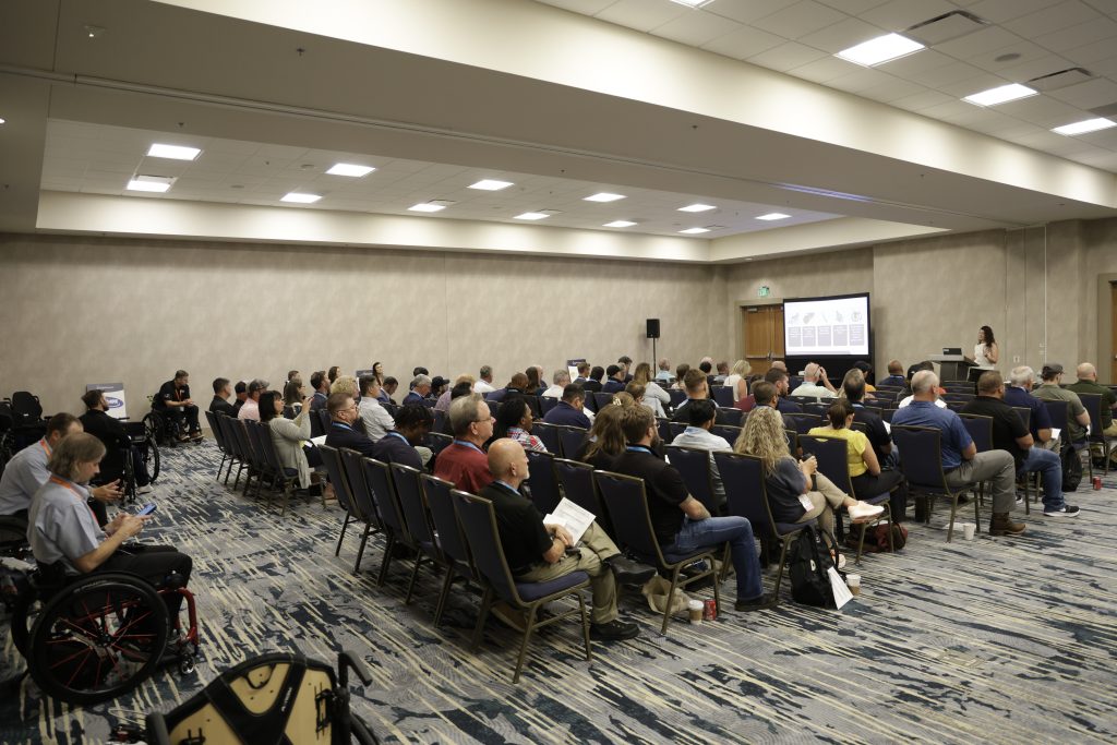 A bach-of-house view of a breakout room at the 2026 Numotion Commercial Growth Summit.