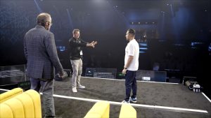 A Tri-Marq Senior Producer gives stage direction to the client before the event.